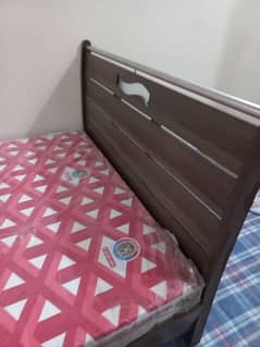 New mattress medicated durafoam. . . with medium wooden bed