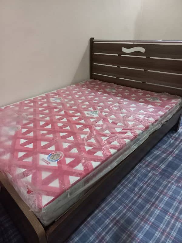 New mattress medicated durafoam. . . with medium wooden bed 1