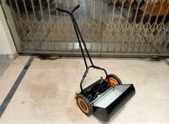 Lawn Mower or Grass cutting machine   03008596760