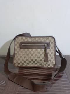 Original Gucci signature crossbody bag.