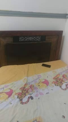 rod iron bed with side table 0