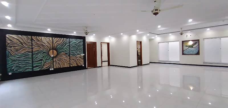 Brand New One Kanal Fully Basement Luxurious Bungalow Boasting Spanish Design Available For Rent In The Prime Location Of DHA Phase 6 7