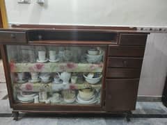 A Wooden Glass cupboard for sale. Good Condition