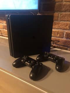 PLAYSTATION 4 SLIM 512 GB   WITH 2 CONSOLES 1 GTA 5 CD NEVER OPEN