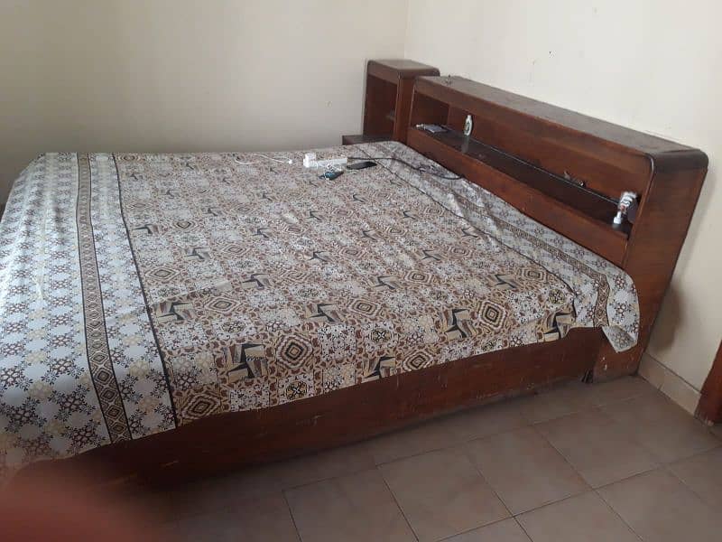 used condition wooden bed for sale 0