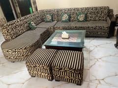 7 seater L shaped sofa with two stools and deewan