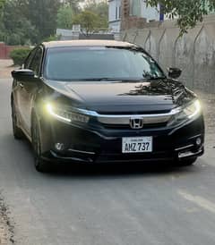 Honda civic 1.8 ug full option