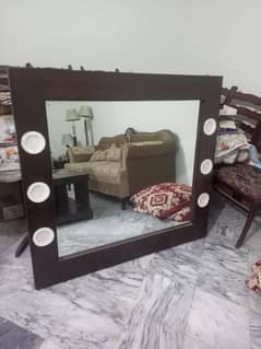 mirror with wooden frame and lights