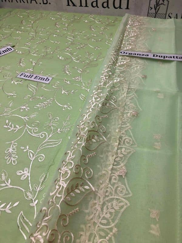 fabric and embroidrey and shirt front is printed. . and free delivery 1