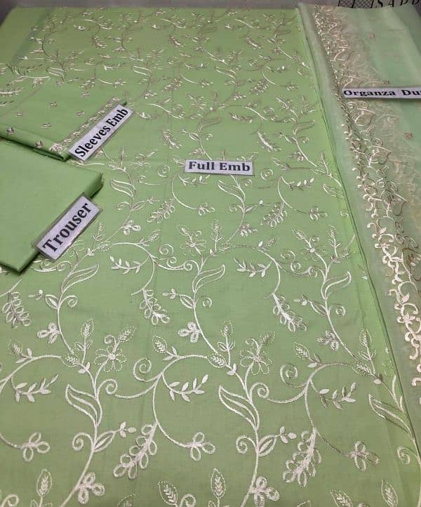 fabric and embroidrey and shirt front is printed. . and free delivery 2