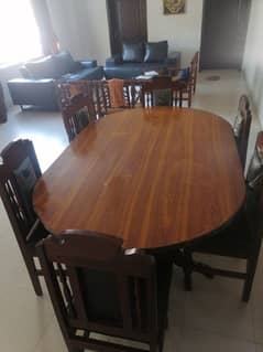 wooden dining tabke with chairs