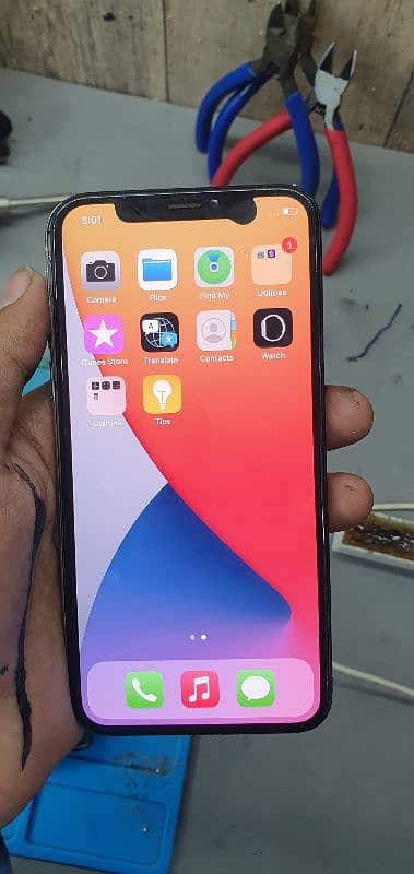 iPhone x screen (panel only) with minor sport on top 1