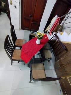 Wooden dining table with chairs urgent sale