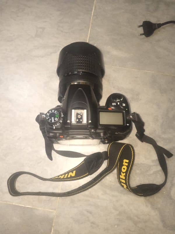 nikon D7000 with lens 18mm 140mm 1