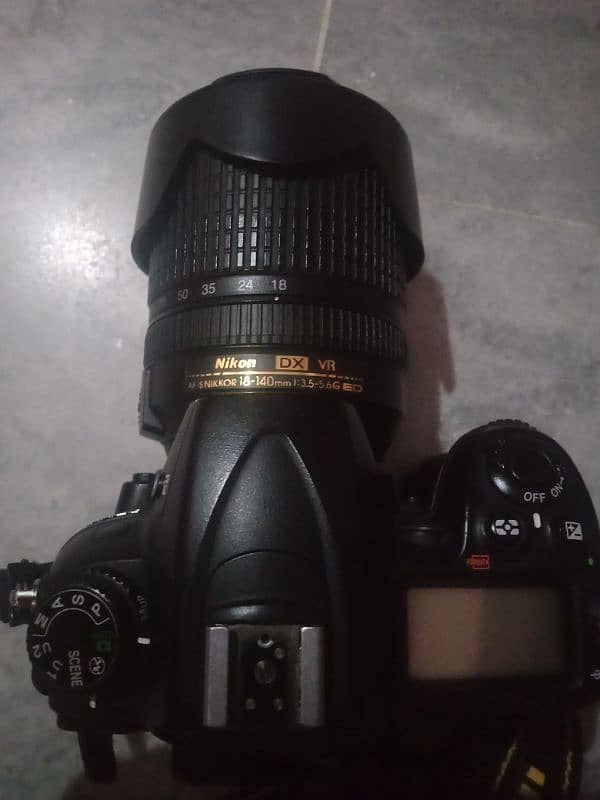 nikon D7000 with lens 18mm 140mm 3