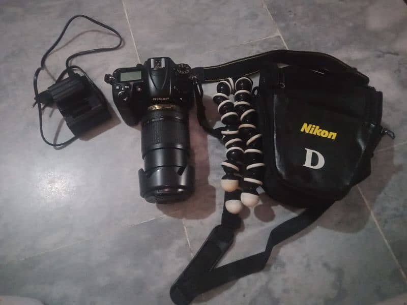 nikon D7000 with lens 18mm 140mm 4