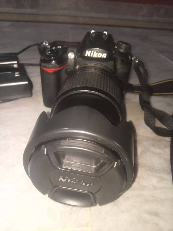 nikon D7000 with lens 18mm 140mm 5