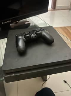 PlayStation 4 Slim 500GB with original controller 10/10