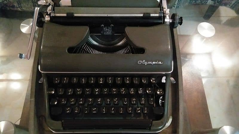 A rare olympia typewriter of made in Germany in 1950s urdu version 0