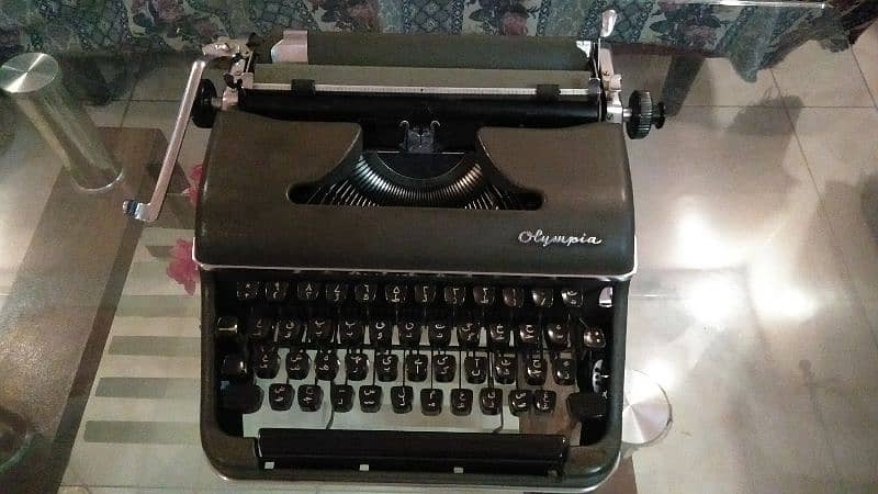 A rare olympia typewriter of made in Germany in 1950s urdu version 7