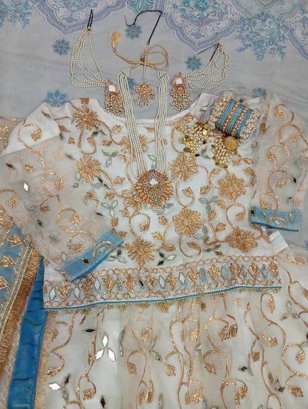 3 piece Lahnga white & gold combination with jewellery 1