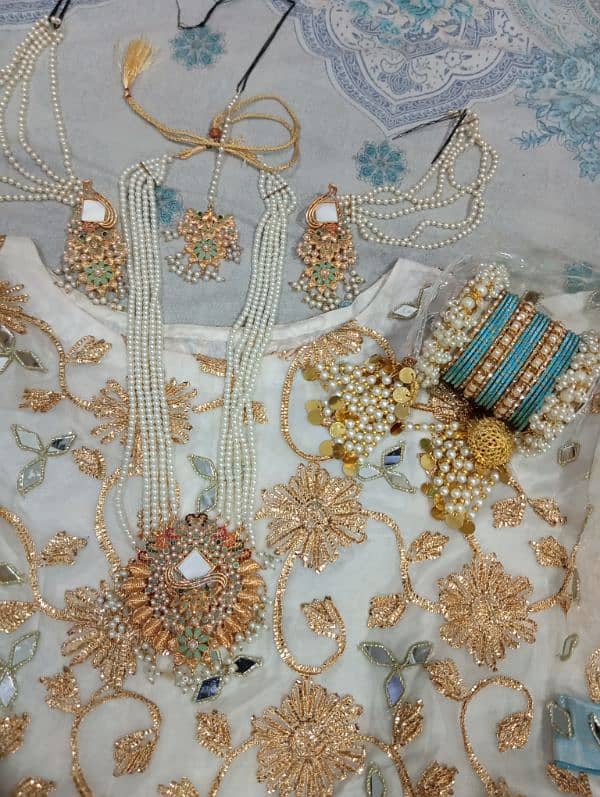 3 piece Lahnga white & gold combination with jewellery 3