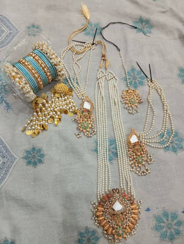 3 piece Lahnga white & gold combination with jewellery 7