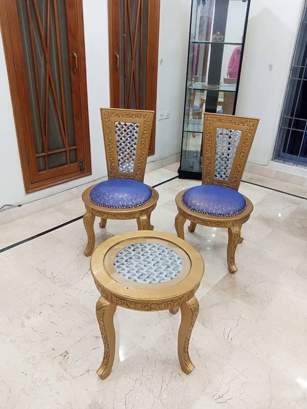 pair of chairs with table 1