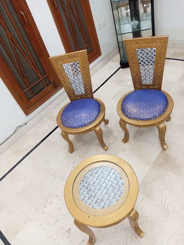 pair of chairs with table 2