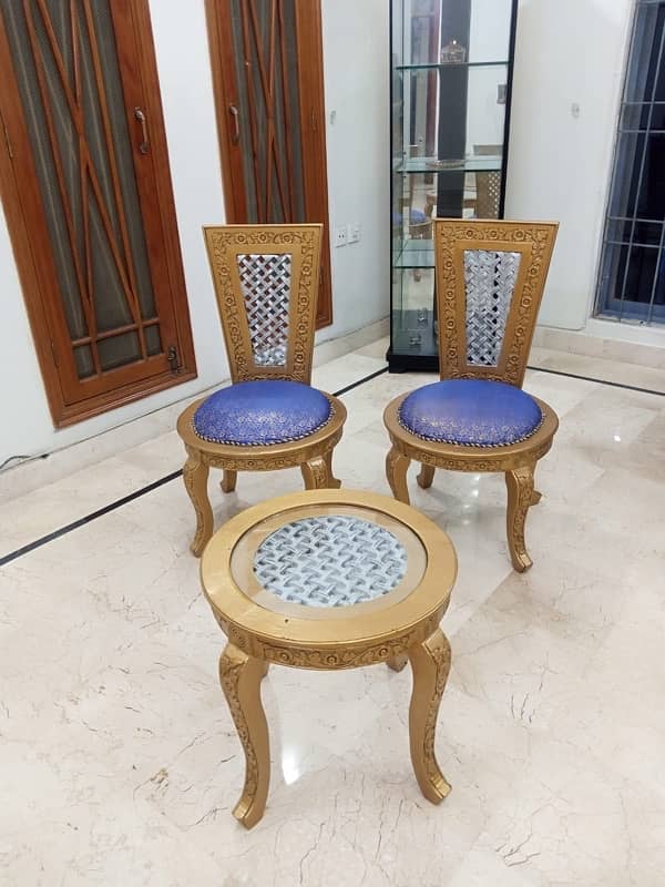 pair of chairs with table 3