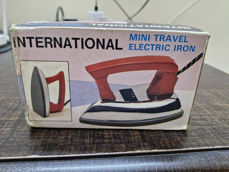 Mini Travel Iron. 1