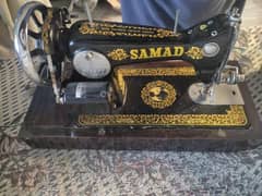 samad brand sewing machine with handle and motor