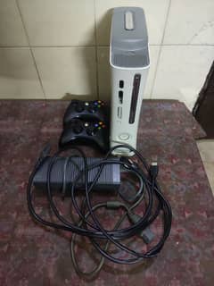 xbox 360, 2 wireless controllers, hdmi wire, power supply and 128 gb