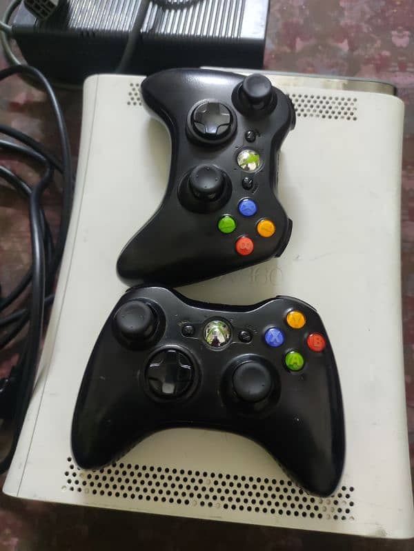 xbox 360, 2 wireless controllers, hdmi wire, power supply and 128 gb 2