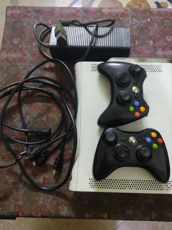 xbox 360, 2 wireless controllers, hdmi wire, power supply and 128 gb 3