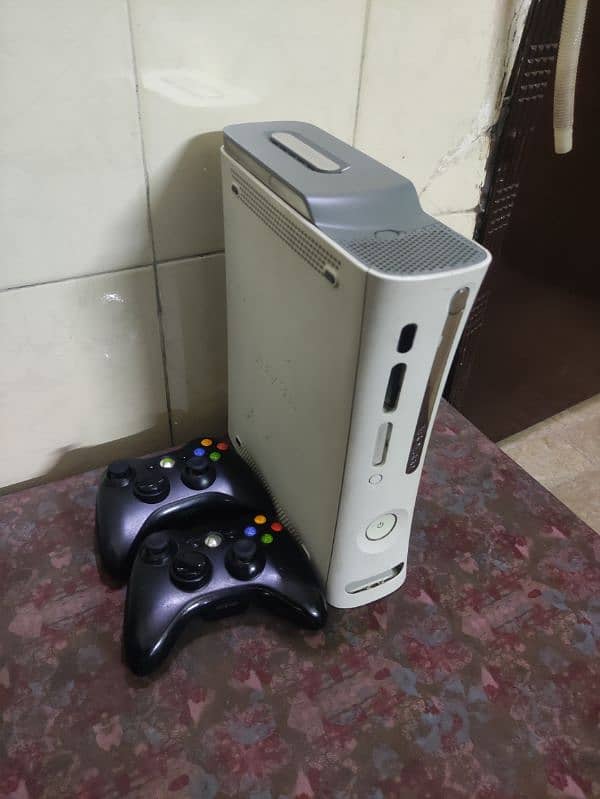 xbox 360, 2 wireless controllers, hdmi wire, power supply and 128 gb 4