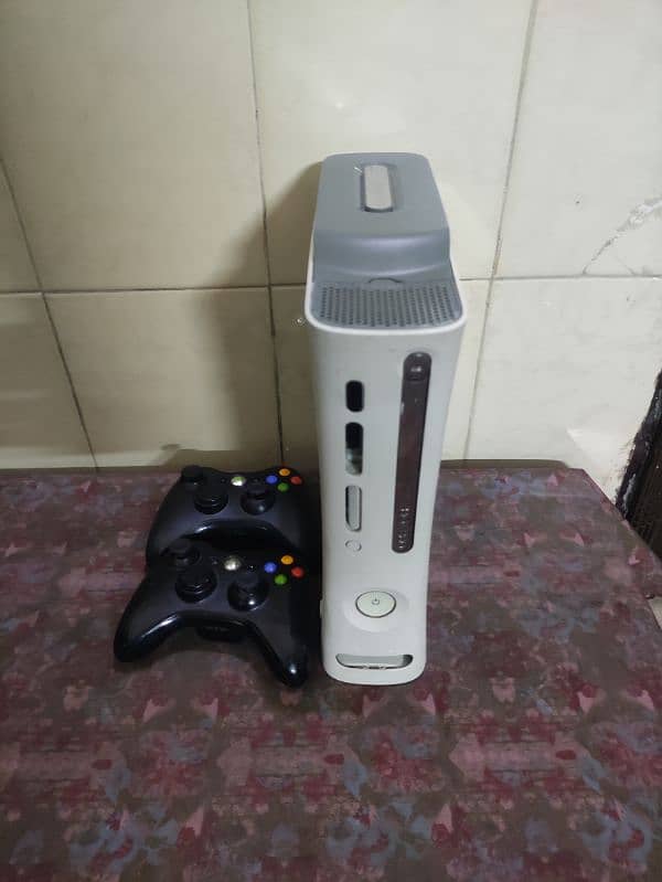 xbox 360, 2 wireless controllers, hdmi wire, power supply and 128 gb 5