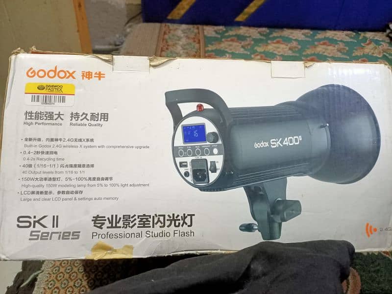 godox sk 300  flash light 10 by 10 18