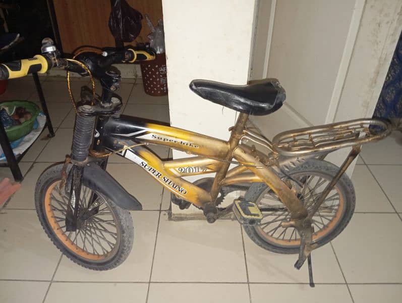 3 Cycles for kids & 1 baby walker urgently for sale 1