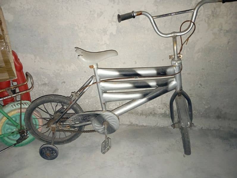 3 Cycles for kids & 1 baby walker urgently for sale 3