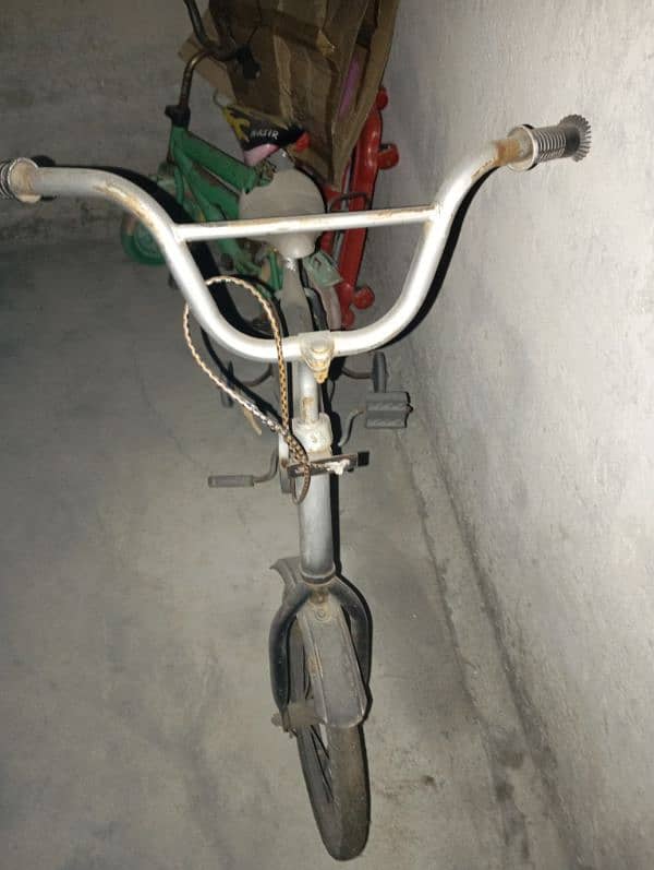 3 Cycles for kids & 1 baby walker urgently for sale 4