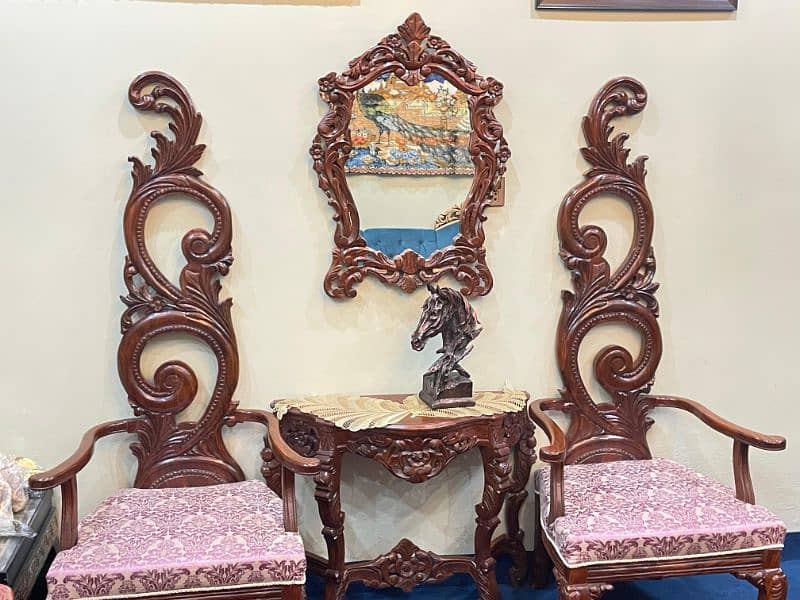 Sheesham wood two large size chairs console mirror and horse statue. 0