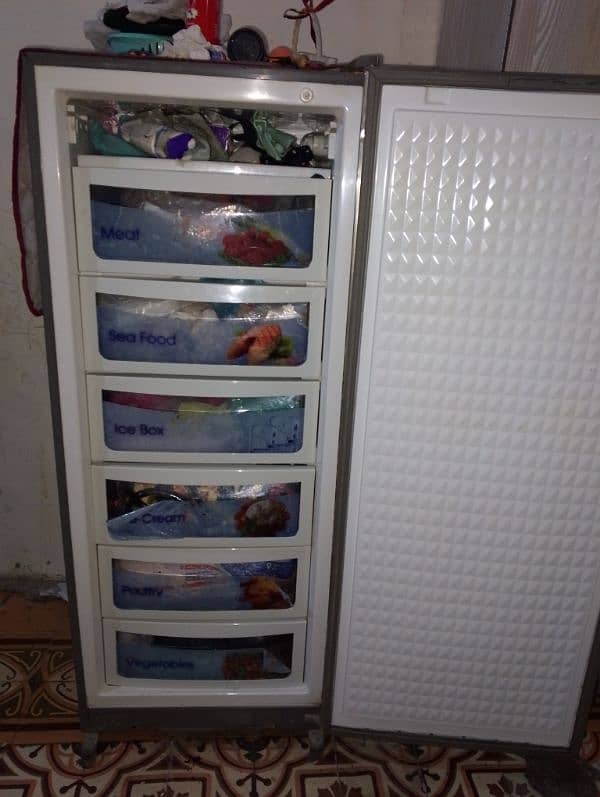 dawlance vertical freezer 1