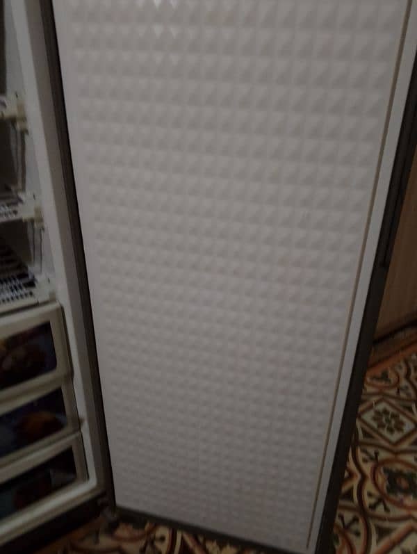 dawlance vertical freezer 12