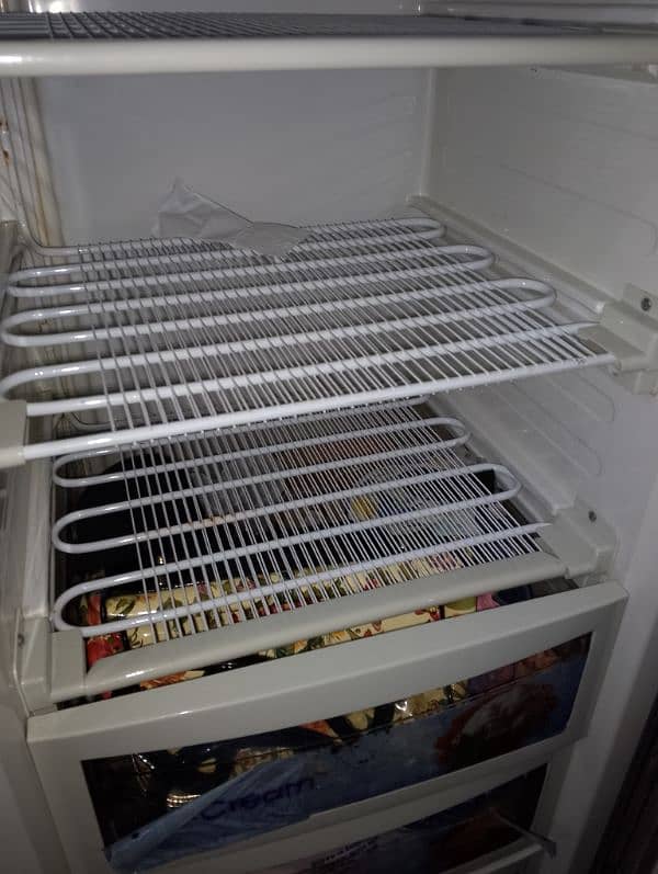 dawlance vertical freezer 14