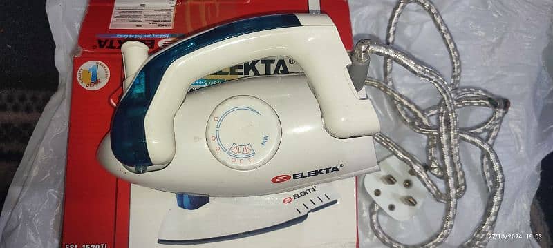 travel steam iron from Dubai 1