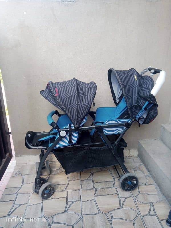 Baby Parm dual space for 2 person with storage underneath all good. 5