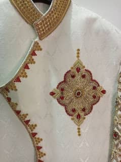 groom sherwani and qula