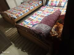 two single bed with two mattress