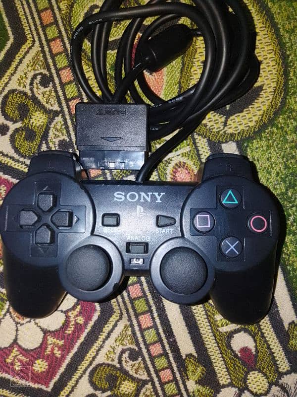 Playstation 2 with complete accessories. 3